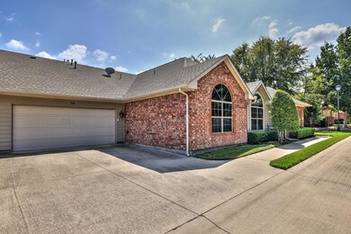 EXTERIOR OF TWO CAR GARAGE SIDE WITH GOOD PARKING 