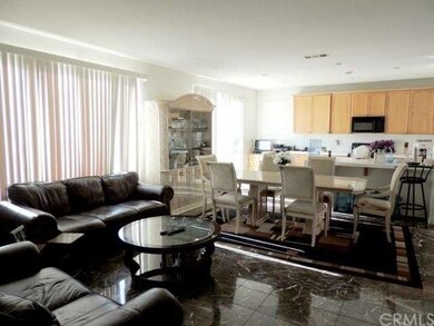View of the Family Room, Dining and Kitchen