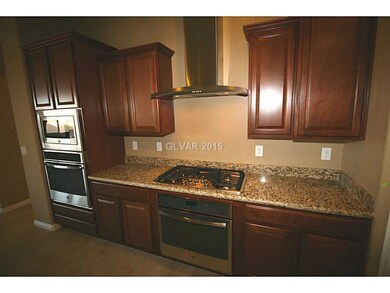 Kitchen. Staggered Cabinets with Crown Molding