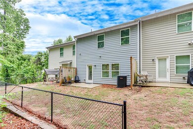 Back of property featuring a patio area