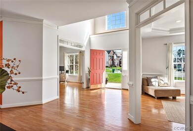 The grand foyer is open to the living room, dinning room and family room.