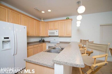 Great kitchen with a bar perfect for entertaining.