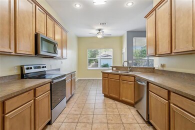 Kitchen with lots of cabinets and a suite of Whirl