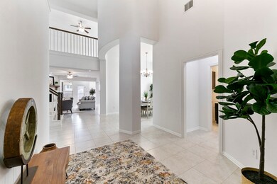 The grand two-story foyer is perfect for showcasing your treasures or holiday décor!