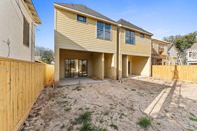 The 11 ft x 16 ft covered patio. Backyard is pool