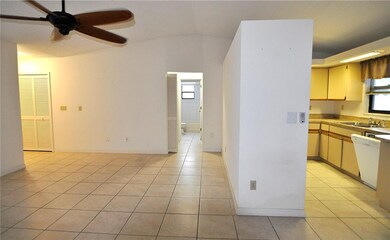 View of Kitchen, Dining/Living Space, Hall to Bedr