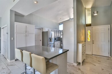 Kitchen and entry