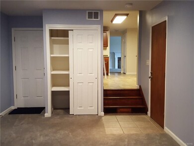 Family room with storage, looking towards kitchen 