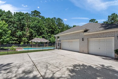 Oversize three car garage and additional parking p