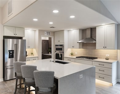 Kitchen featuring sink, appliances with stainless