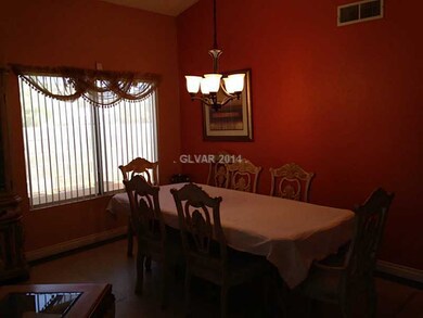 Property Photo. Formal Dining with Vaulted Ceiling
