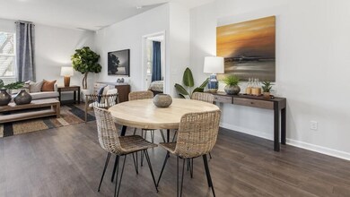 Dining area featuring dark hardwood / wood-style f