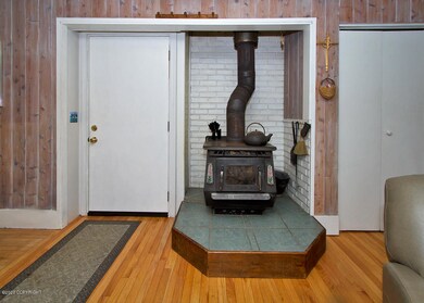 wood stove -  garage entry door on left
