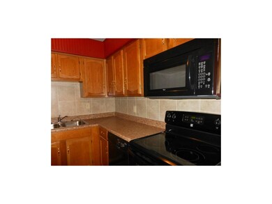 Updated kitchen with newer cabinets, counter tops,