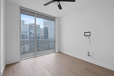 Spare room with floor to ceiling windows, wood fi