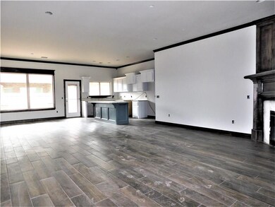 Under construction.  Living room with wood look ce