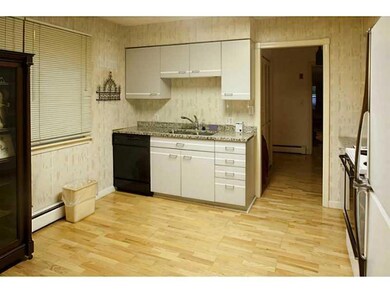 Kitchen. Easily fits another table...
