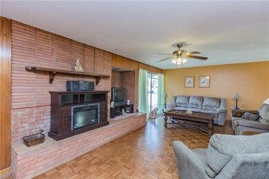 Oversize hearth with built in space adds charm to