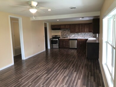 Walk into the open floor plan.