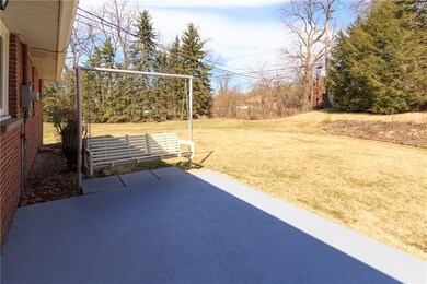 A view from the patio to the far corner of the yar