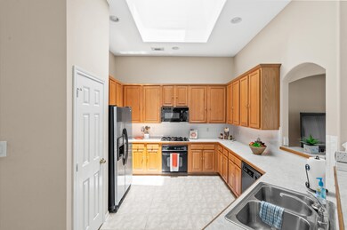 The kitchen featuring lots of cabinets for storage