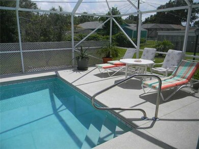 Exterior Back. Plenty of pool deck to lounge aroun