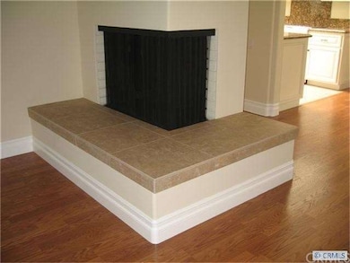Italian Tile Surrounding Fireplace