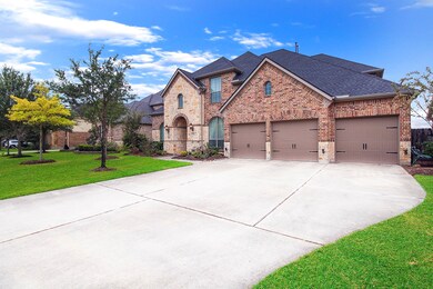 Extra long & wide Driveway extends to the 3 Car Garage is ready for your vehicle parking needs.