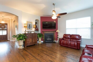 Hardwood Floors & A Gas Burning Fireplace Add To The Beauty Of This Open Concept Great Room!