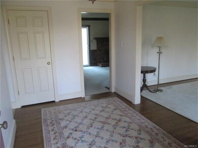 Entrance Foyer with hardwood Coat Closet