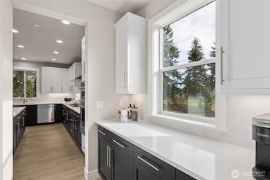 Butler Pantry ties Dining to Kitchen & creates optimum coffee bar! Photos are for representational purposes only.  Colors and options may vary.