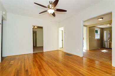 Living Room Looking Towards Kitchen and Bedroom