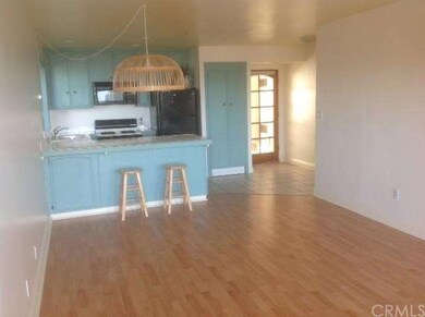 Looking towards the Kitchen and Front Door from th