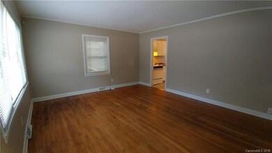 Kitchen has tile floor and washer dryer hookups