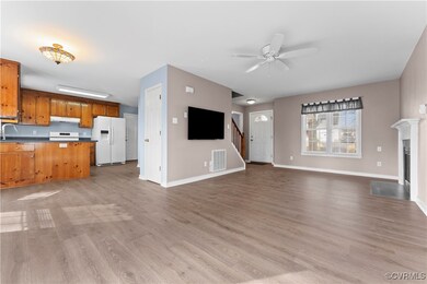 Unfurnished living room with visible vents, a ceil