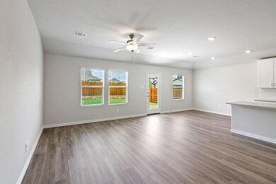 Unfurnished living room with wood-look EVP floorin