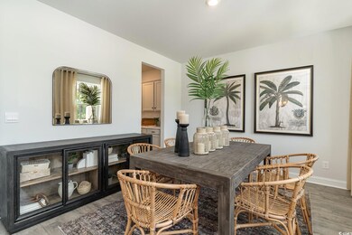 Dining room with hardwood / wood-style floors