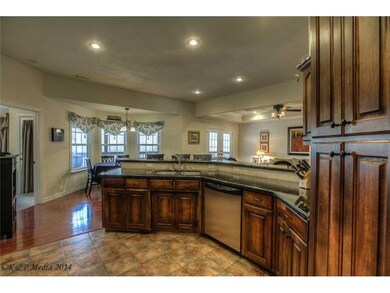 Kitchen. Lots of storage space, granite countertops, and open floor plan
