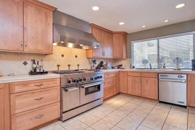 Gourmet kitchen, with large commercial stove and o