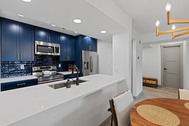 Kitchen is open to the dining area.  Room for bars