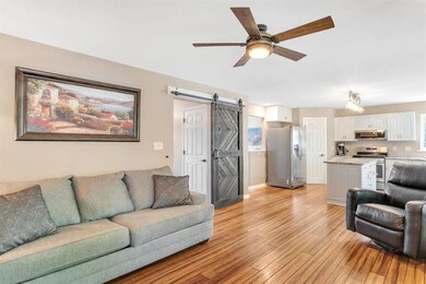 The living room is open to the kitchen.  There is 