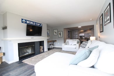 Warm your toes with the wood burning fireplace