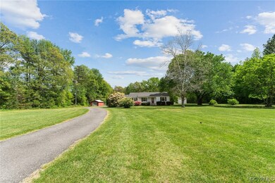 Big front yard, paved circular driveway & new roof