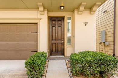 Beautifully refinished solid wood entry door surro