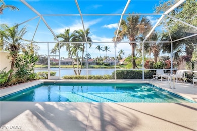View of swimming pool featuring a patio, a water v