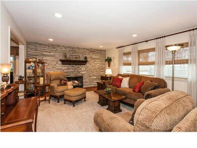 LIVING ROOM WITH BEAUTIFUL FIREPLACE