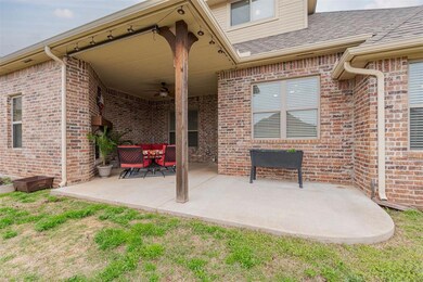 View of patio / terrace featuring ceiling fan