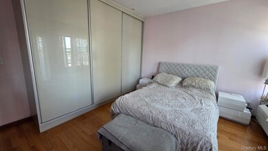 Bedroom featuring a closet and light wood finished floors