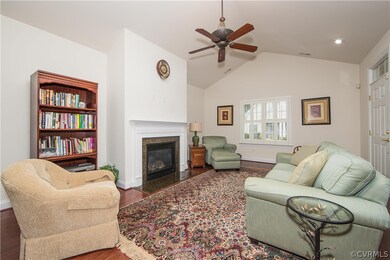 Great Room features cathedral ceiling, wood floors