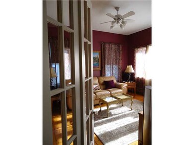 Living Room. Elegant touches such as  French Door